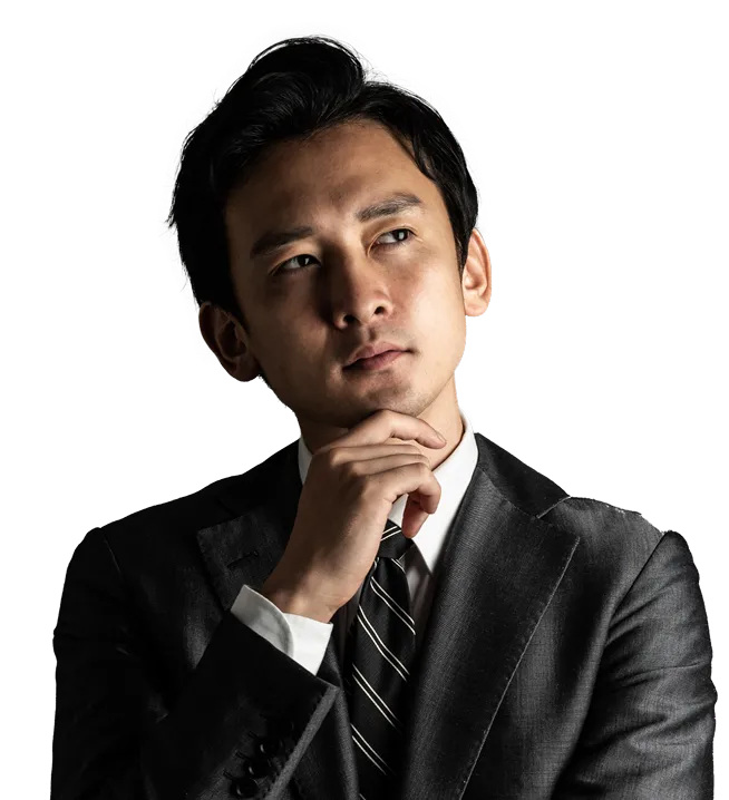 悩んでいるビジネスマン